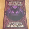 In the Hand of the Goddess